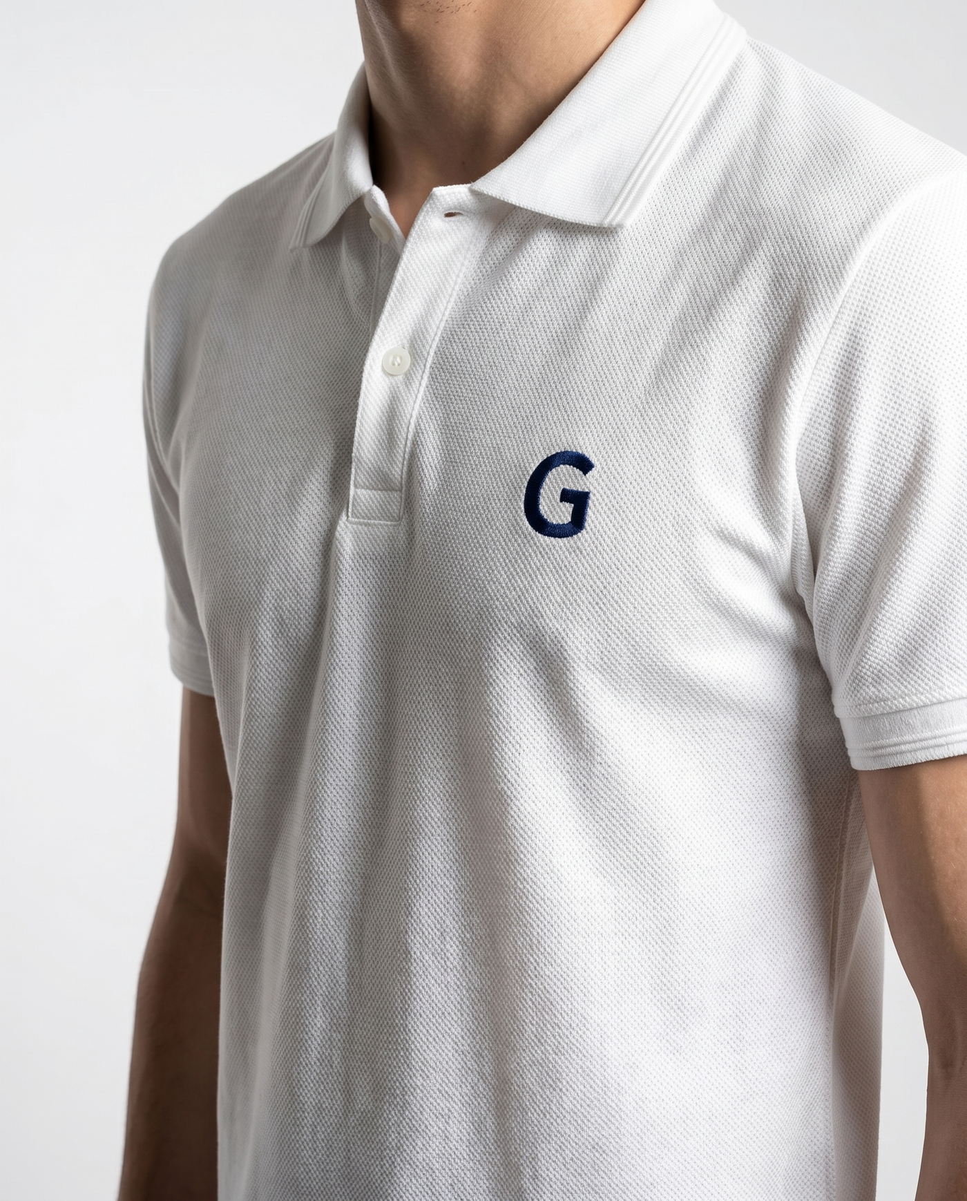 Built to hold its line — Men's White Popcorn Polo