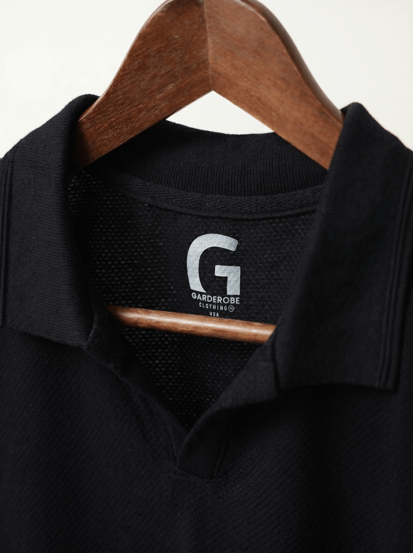 Cut tailored, not tight — Black Polo Shirt