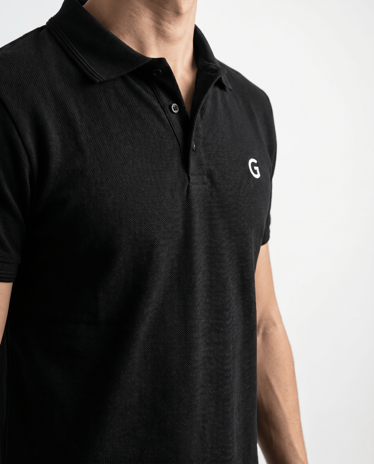 Built to hold its line — Men's Black Popcorn Polo